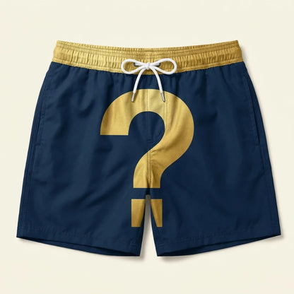 The Mystery Pair — navy trunks with a gold question mark